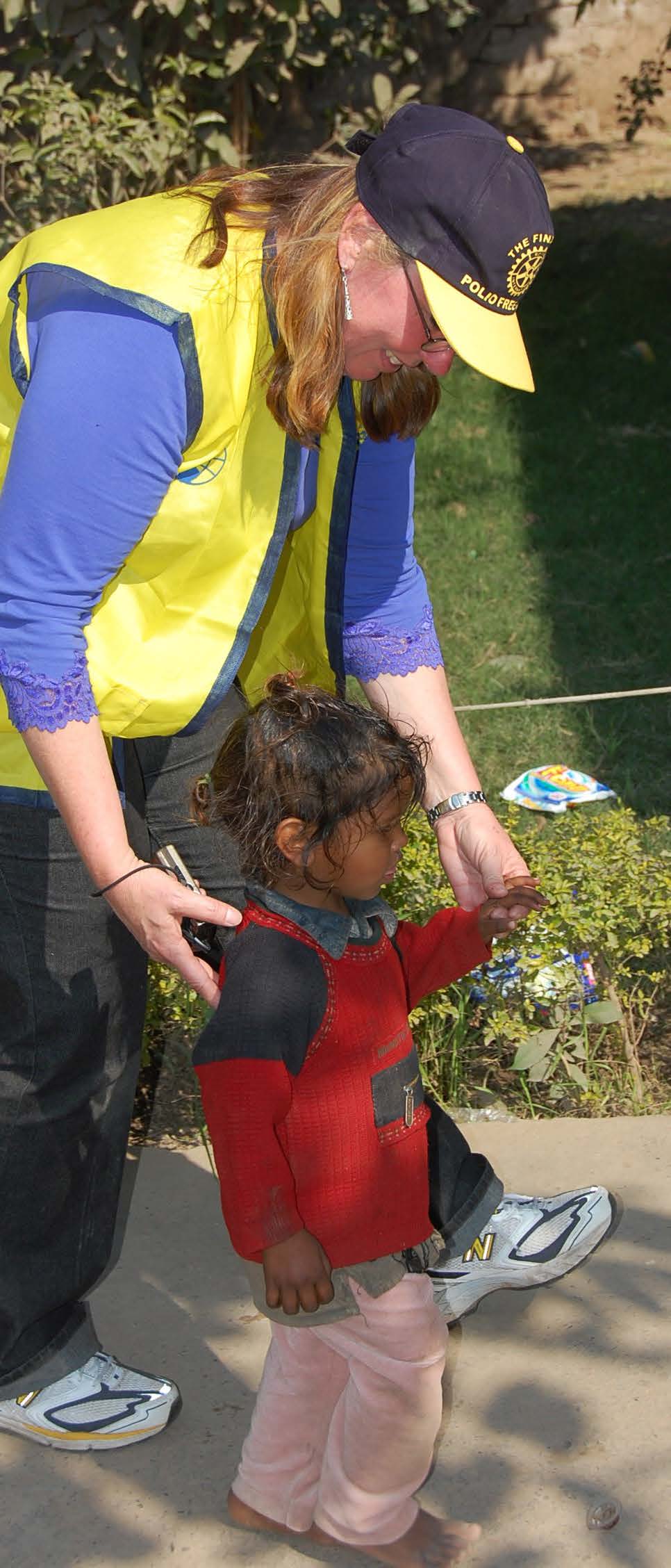 With child in red top