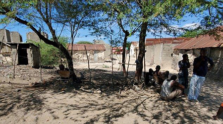 Ferrier sitting in shade