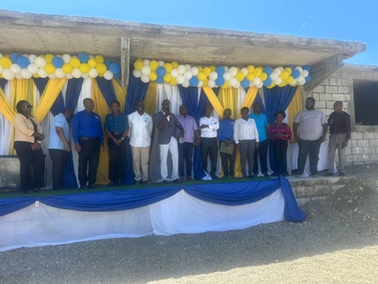 Dignitaries on stage in Leogane