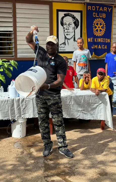 Fritz with his bucket at the District 7020 Conference in Jamaica